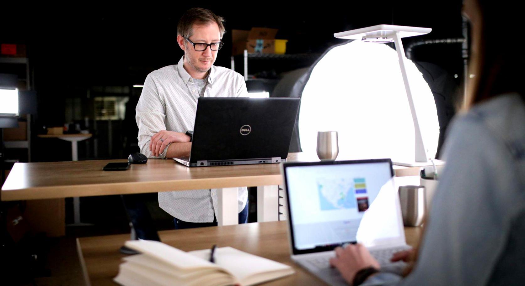 Business professionals reviewing financial reports collaboratively